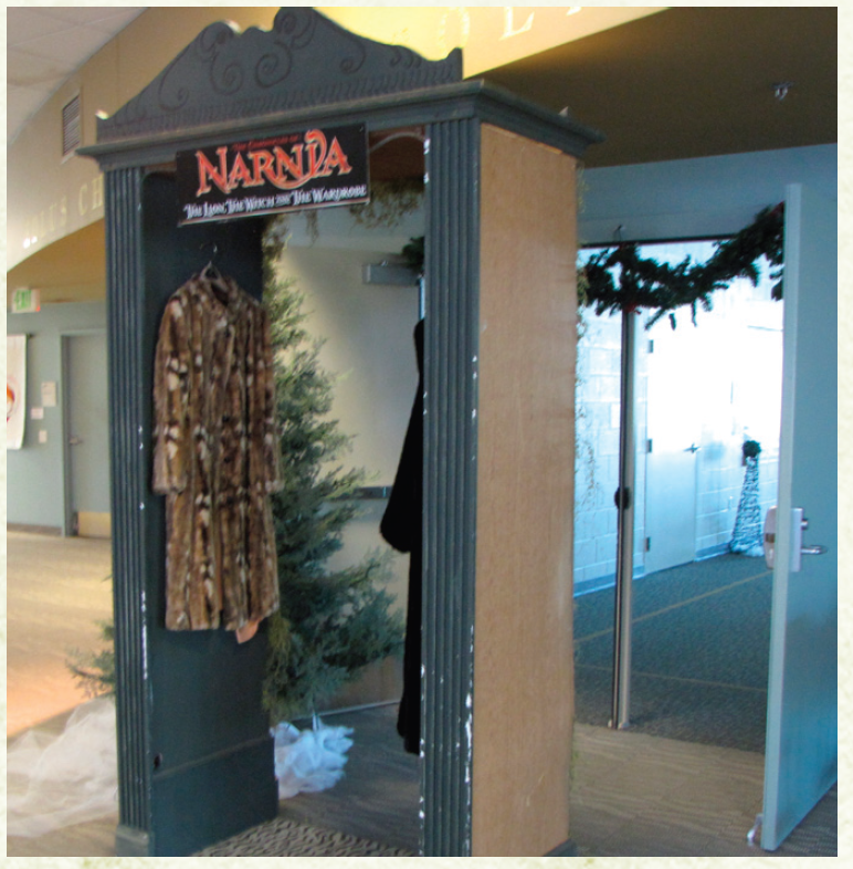 Doorway as wardrobe with fur coats