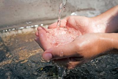 Hands in water