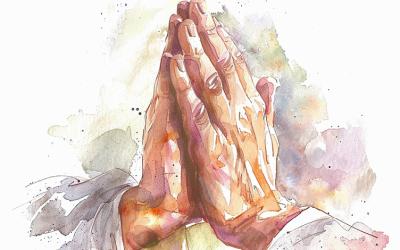 Hands held in prayer
