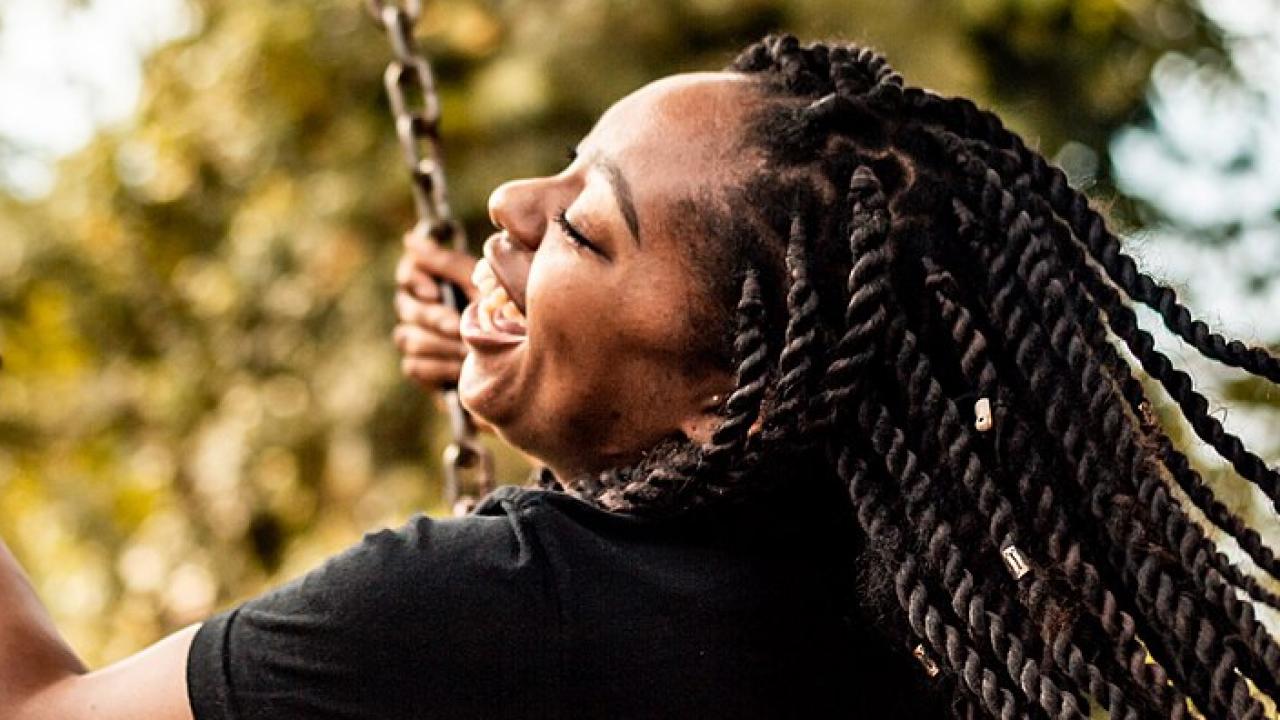 picture of woman on a swing