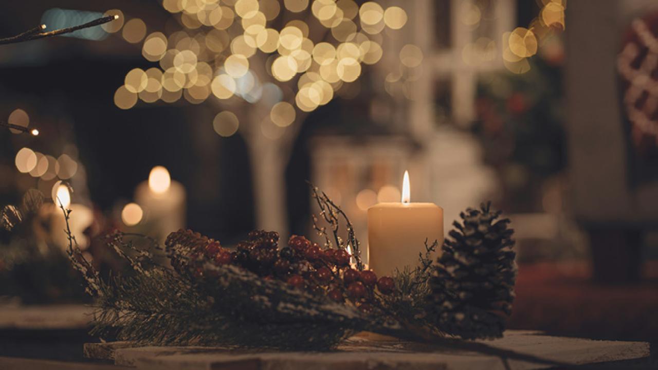 Candle and a pinecone