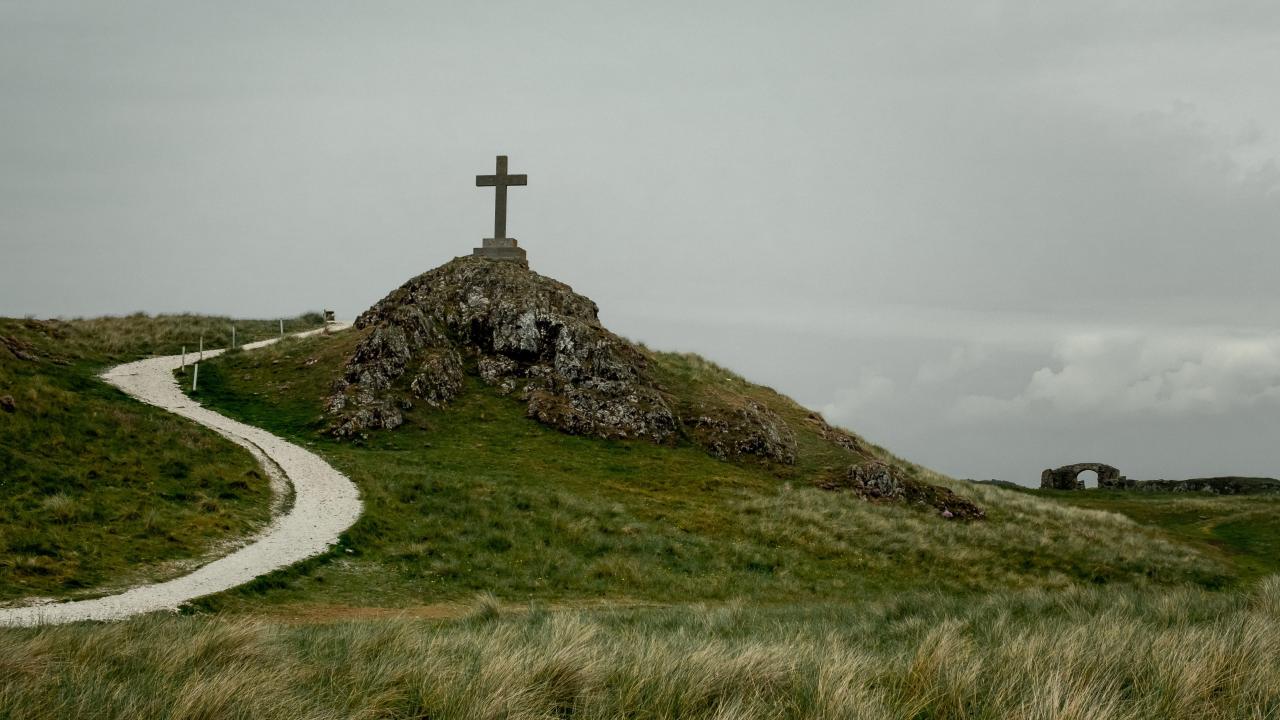 Cross on rocky mound