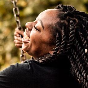 picture of woman on a swing